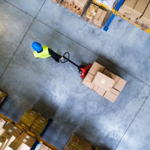 warehouse worker pulling package load